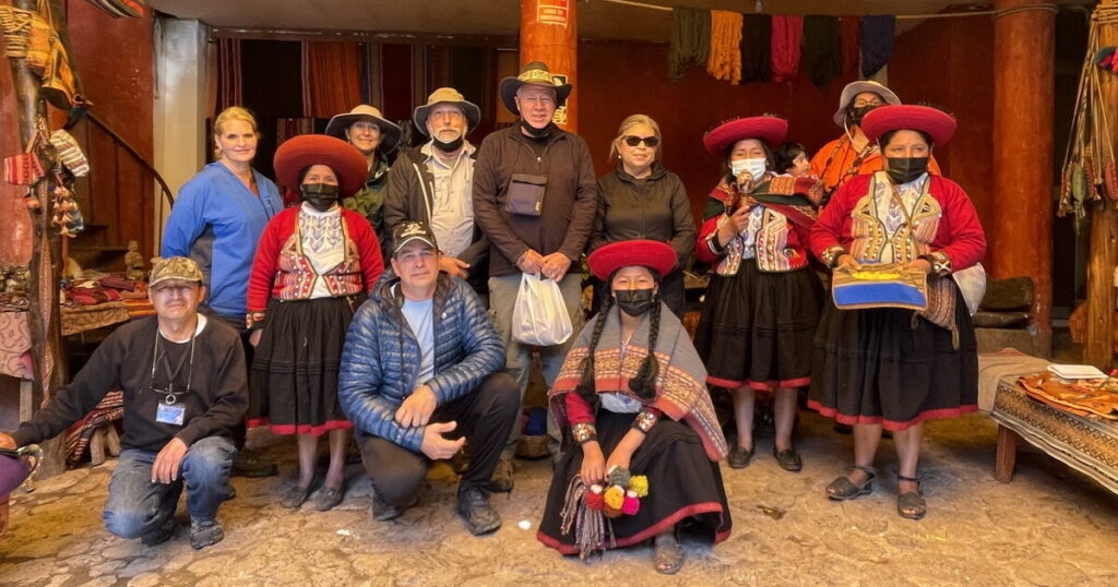 Millie with volunteers and weavers at Chinchero