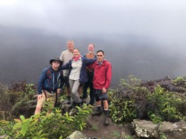 Andres with volunteers at Sierra Negra in the Galapagos