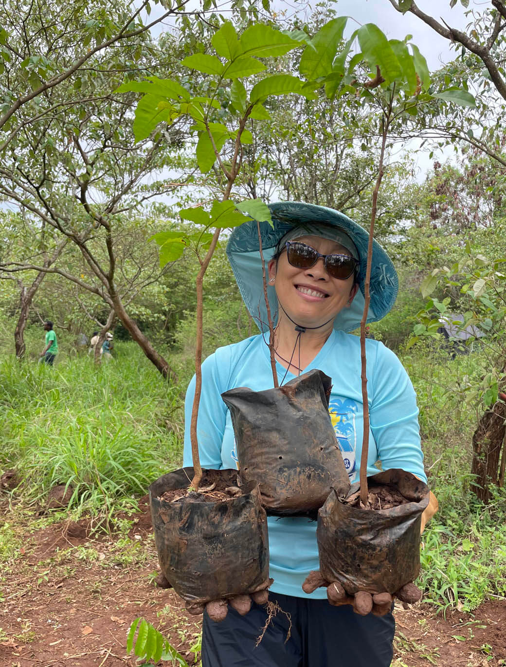 volunteer with trees to be planted